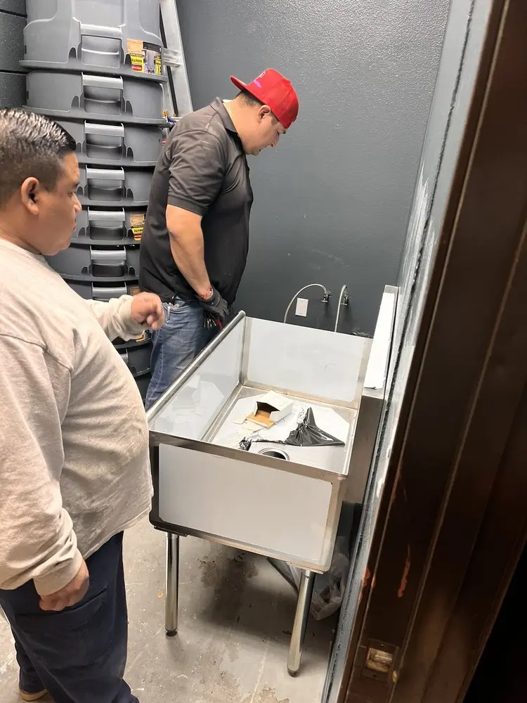 Commercial plumbing and sink installation in East Scott
